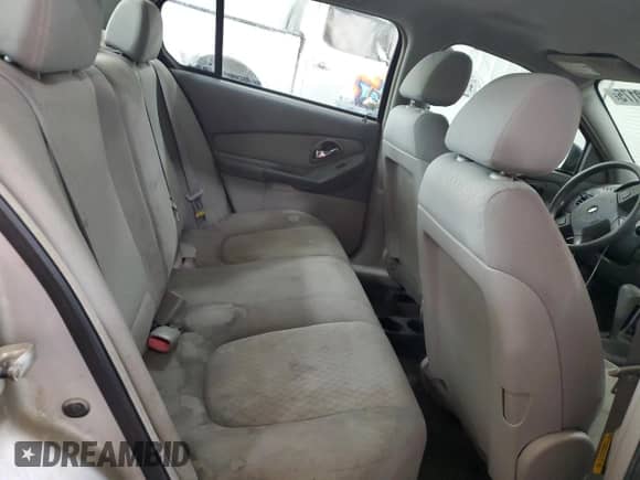 2004 Chevrolet Malibu z VIN 1G1ZS52FX4F152685, wystawiony jako Copart lot #63040175 z przebiegiem 407 264 mil mil oraz Szkoda całkowita • Salvage title. Historia ofert i sprzedaży dostępna na DreamBid. Obrazek 10.