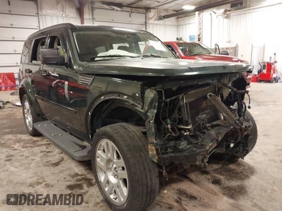 2010 Dodge Nitro Heat with VIN 1D4PT4GK1AW156988, listed as a IAAI auction lot 42415484 with 160,084 mi miles and . Bid and sale history available at DreamBid. Image 1.