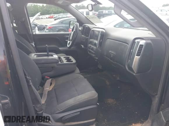 2014 Chevrolet Silverado 1500 LT z VIN 3GCUKREC9EG567345, wystawiony jako IAAI lot #42550781 z przebiegiem 184 860 mil mil oraz . Historia ofert i sprzedaży dostępna na DreamBid. Obrazek 5.