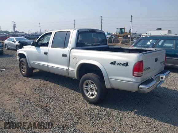 2004 Dodge Dakota SLT with VIN 1D7HG48N14S510024, listed as a IAAI auction lot 43156178 with 148,700 mi miles and . Bid and sale history available at DreamBid. Image 3.