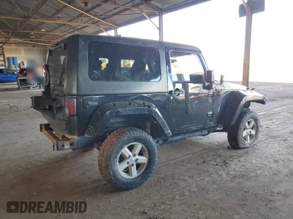 2011 Jeep Wrangler Sport с VIN 1J4AA2D19BL569120, выставлен на аукционе Copart как лот 82004925 с пробегом 149 555 миль миль и Списание • Salvage title. История ставок и продаж доступна на DreamBid. Изображение 3.