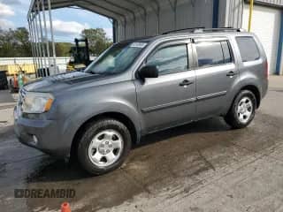 2011 Honda Pilot LX with VIN 5FNYF3H25BB002677, listed as a Copart auction lot 86169985 with 265,352 mi miles and Salvage title. Bid and sale history available at DreamBid. Image 1.