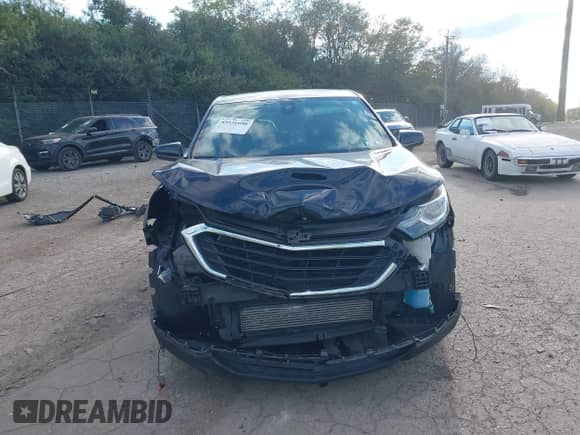 2020 Chevrolet Equinox LT z VIN 2GNAXTEV3L6233315, wystawiony jako IAAI lot #43531686 z przebiegiem 106 456 mil mil oraz . Historia ofert i sprzedaży dostępna na DreamBid. Obrazek 13.
