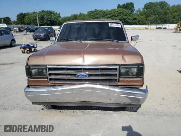 1989 Ford F-150 z VIN 2FTDF15Y1KCB50506, wystawiony jako Copart lot #68017895 z przebiegiem 77 537 mil mil oraz Czysty tytuł • Clean title. Historia ofert i sprzedaży dostępna na DreamBid. Obrazek 5.