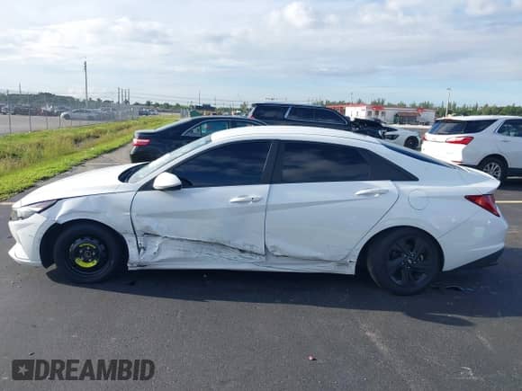 2021 Hyundai Elantra Blue z VIN KMHLM4AJ6MU008632, wystawiony jako IAAI lot #43378878 z przebiegiem 61 640 mil mil oraz . Historia ofert i sprzedaży dostępna na DreamBid. Obrazek 15.