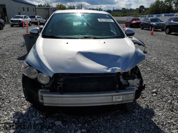 2014 Chevrolet Sonic LS с VIN 1G1JB6SH5E4179293, выставлен на аукционе Copart как лот 85748955 с пробегом 147 969 миль миль и Списание • Salvage title. История ставок и продаж доступна на DreamBid. Изображение 5.