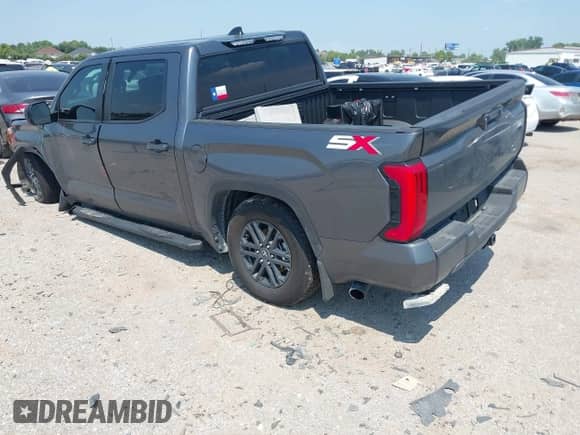 2025 Toyota Tundra SR with VIN 5TFLA5AB2SX048486, listed as a IAAI auction lot 43037169 with 4,902 mi miles and . Bid and sale history available at DreamBid. Image 3.