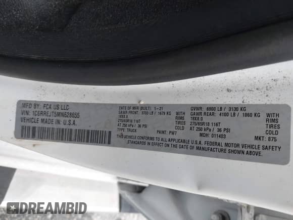 2021 Ram 1500 Laramie with VIN 1C6RREJT5MN628655, listed as a IAAI auction lot 42734346 with 104,116 mi miles and . Bid and sale history available at DreamBid. Image 9.