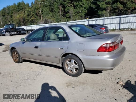 1998 Honda Accord EX with VIN 1HGCG1659WA077830, listed as a Copart auction lot 87064775 with 167,158 mi miles and Clean title. Bid and sale history available at DreamBid. Image 2.
