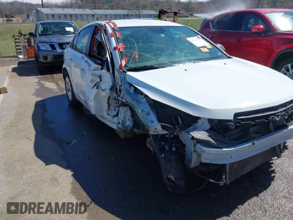 2015 Chevrolet Cruze LS with VIN 1G1PB5SHXF7231716, listed as a IAAI auction lot 41764515 with 200,094 mi miles and . Bid and sale history available at DreamBid. Image 6.