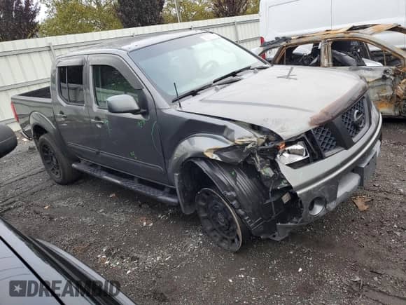 2005 Nissan Frontier SE z VIN 1N6AD07W65C429259, wystawiony jako Copart lot #82269745 z przebiegiem 368 958 mil mil oraz Szkoda całkowita • Salvage title. Historia ofert i sprzedaży dostępna na DreamBid. Obrazek 4.