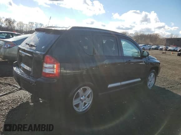 2010 Jeep Compass Sport z VIN 1J4NT1FB3AD641479, wystawiony jako Copart lot #79859594 z przebiegiem 173 768 mil mil oraz Szkoda całkowita • Salvage title. Historia ofert i sprzedaży dostępna na DreamBid. Obrazek 3.