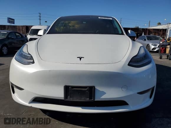 2023 Tesla Model Y Long Range with VIN 7SAYGDEE8PA093209, listed as a Copart auction lot 80299485 with 90,434 mi miles and Salvage title. Bid and sale history available at DreamBid. Image 5.