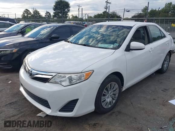 2014 Toyota Camry SE with VIN 4T1BF1FK2EU304772, listed as a IAAI auction lot 43352345 with 185,853 mi miles and . Bid and sale history available at DreamBid. Image 17.