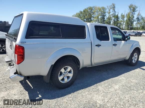 2012 Nissan Frontier SV with VIN 1N6AD0FV0CC428632, listed as a Copart auction lot 68339175 with 97,960 mi miles and Salvage title. Bid and sale history available at DreamBid. Image 3.