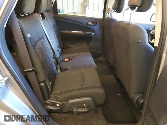 2018 Dodge Journey SE z VIN 3C4PDCAB2JT513954, wystawiony jako Copart lot #87077795 z przebiegiem 49 216 mil mil oraz Szkoda całkowita • Salvage title. Historia ofert i sprzedaży dostępna na DreamBid. Obrazek 11.