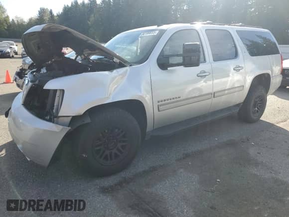 2011 Chevrolet Suburban LT с VIN 1GNSKJE3XBR348423, выставлен на аукционе Copart как лот 84199055 с пробегом Не указан миль и Списание • Salvage title. История ставок и продаж доступна на DreamBid. Изображение 1.