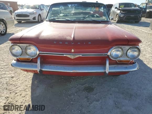 1964 Chevrolet Corvair with VIN 40967W287137, listed as a Copart auction lot 77769384 with 3,143 mi miles and Salvage title. Bid and sale history available at DreamBid. Image 5.