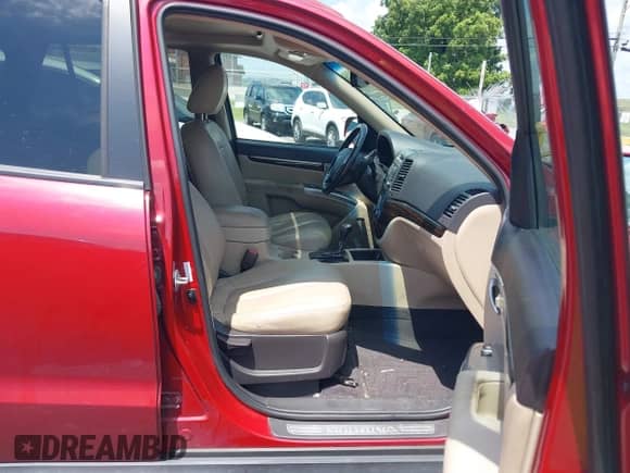 2012 Hyundai Santa Fe Limited с VIN 5XYZKDAG7CG145474, выставлен на аукционе IAAI как лот 42692080 с пробегом 186 750 миль миль и . История ставок и продаж доступна на DreamBid. Изображение 5.