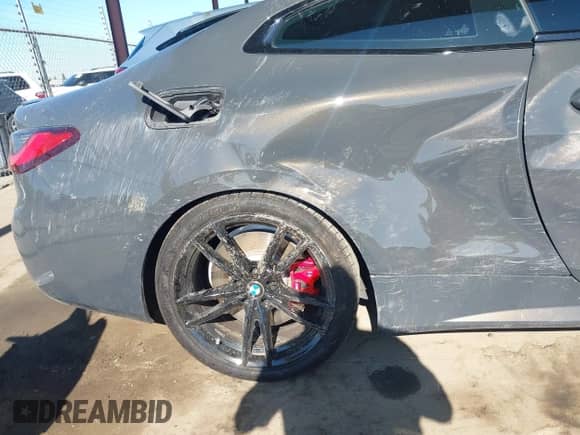 2022 BMW 4 Series M440i xDrive with VIN WBA13AR05NCJ90711, listed as a IAAI auction lot 42809557 with 17,854 mi miles and . Bid and sale history available at DreamBid. Image 6.