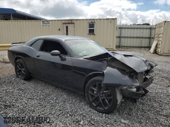 2023 Dodge Challenger SXT with VIN 2C3CDZAG3PH527851, listed as a Copart auction lot 68279835 with 34,450 mi miles and Salvage title. Bid and sale history available at DreamBid. Image 4.