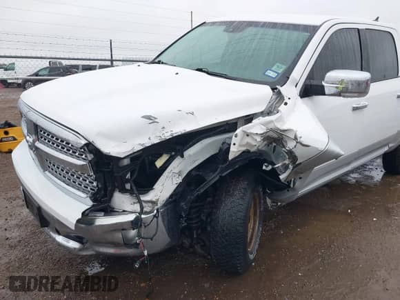 2018 Ram 1500 Laramie with VIN 1C6RR7NT3JS117772, listed as a IAAI auction lot 41336664 with 84,143 mi miles and . Bid and sale history available at DreamBid. Image 6.