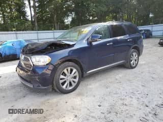 2013 Dodge Durango Crew with VIN 1C4RDHDG1DC530242, listed as a Copart auction lot 62873485 with 134,323 mi miles and Salvage title. Bid and sale history available at DreamBid. Image 1.