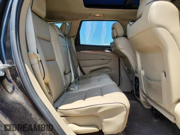 2012 Jeep Grand Cherokee Overland with VIN 1C4RJFCT9CC346497, listed as a Copart auction lot 63004635 with 142,623 mi miles and Salvage title. Bid and sale history available at DreamBid. Image 11.