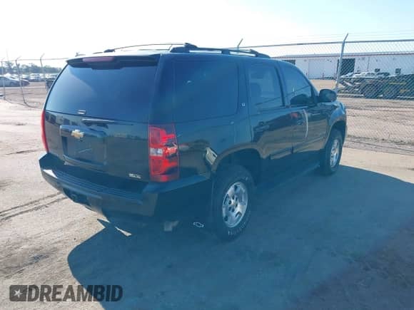 2009 Chevrolet Tahoe 2LT with VIN 1GNFK23079R260424, listed as a IAAI auction lot 43026277 with 253,109 mi miles and . Bid and sale history available at DreamBid. Image 4.