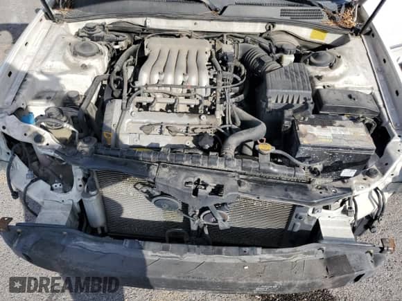 2004 Hyundai Sonata GLS z VIN KMHWF35H64A073703, wystawiony jako Copart lot #74333504 z przebiegiem 105 034 mil mil oraz Szkoda całkowita • Salvage title. Historia ofert i sprzedaży dostępna na DreamBid. Obrazek 12.