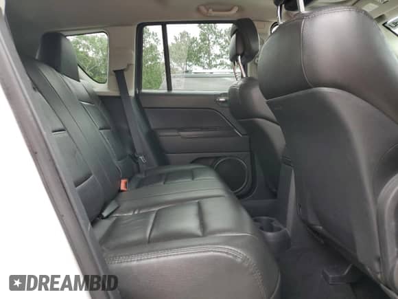 2011 Jeep Compass with VIN 1J4NT1FA2BD239591, listed as a Copart auction lot 59278535 with 138,006 mi miles and Salvage title. Bid and sale history available at DreamBid. Image 11.