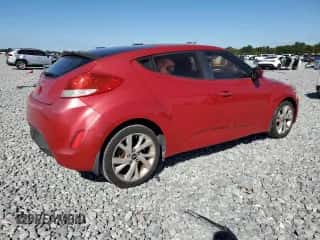 2016 Hyundai Veloster z VIN KMHTC6AD2GU284917, wystawiony jako Copart lot #86281705 z przebiegiem 150 588 mil mil oraz Czysty tytuł • Clean title. Historia ofert i sprzedaży dostępna na DreamBid. Obrazek 3.