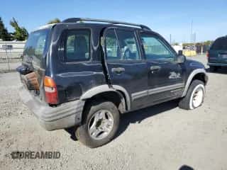 2002 Chevrolet Tracker ZR2 with VIN 2CNBJ734X26948098, listed as a Copart auction lot 73135754 with 234,627 mi miles and Salvage title. Bid and sale history available at DreamBid. Image 3.
