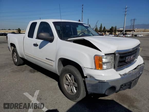 2007 GMC Sierra 1500 SLE1 with VIN 1GTEC19C87Z570530, listed as a Copart auction lot 60296765 with 215,143 mi miles and Salvage title. Bid and sale history available at DreamBid. Image 4.