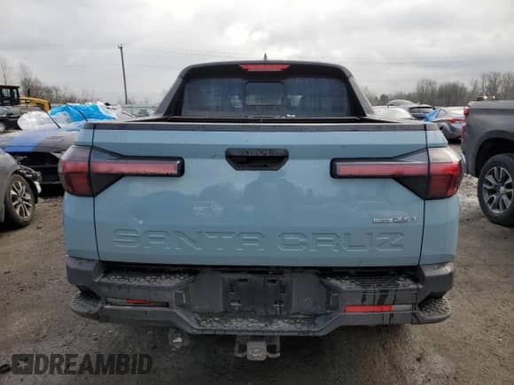 2022 Hyundai Santa Cruz SEL Premium z VIN 5NTJDDAF9NH038731, wystawiony jako Copart lot #42001124 z przebiegiem 14 208 mil mil oraz Szkoda całkowita • Salvage title. Historia ofert i sprzedaży dostępna na DreamBid. Obrazek 6.