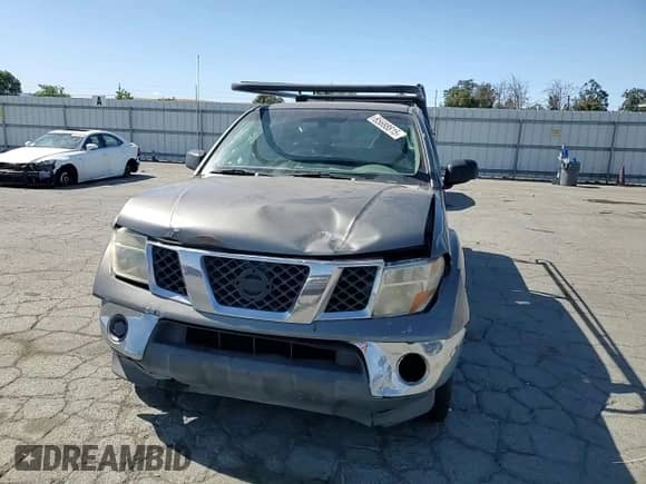 2006 Nissan Frontier SE with VIN 1N6AD07U36C427985, listed as a Copart auction lot 65688815 with 327,628 mi miles and Salvage title. Bid and sale history available at DreamBid. Image 13.