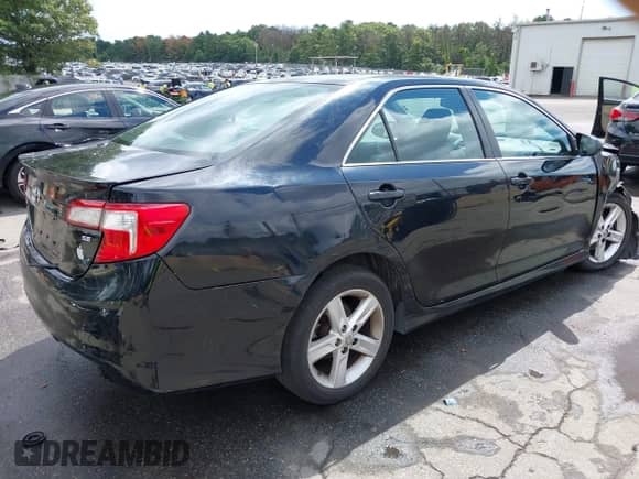 2014 Toyota Camry SE with VIN 4T1BF1FKXEU365335, listed as a IAAI auction lot 43098540 with 313,853 mi miles and . Bid and sale history available at DreamBid. Image 4.