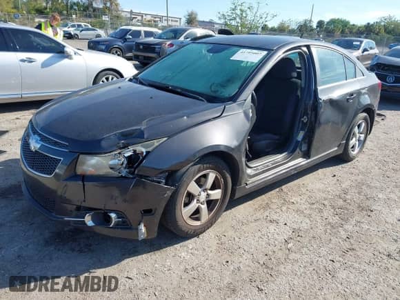2014 Chevrolet Cruze 1LT with VIN 1G1PD5SB5E7167394, listed as a IAAI auction lot 41795007 with Not provided miles and . Bid and sale history available at DreamBid. Image 2.