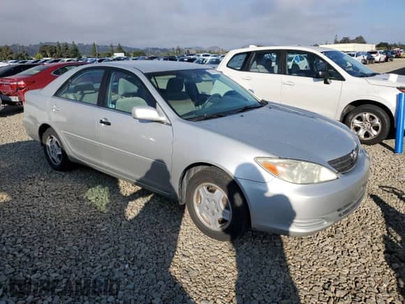 2003 Toyota Camry LE with VIN 4T1BF30K43U544407, listed as a Copart auction lot 82562555 with 151,975 mi miles and Salvage title. Bid and sale history available at DreamBid. Image 4.