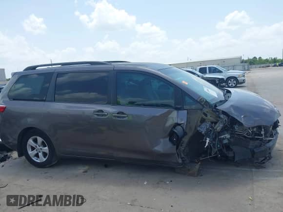 2015 Toyota Sienna LE AAS with VIN 5TDKK3DC0FS689388, listed as a IAAI auction lot 42680055 with 146,119 mi miles and . Bid and sale history available at DreamBid. Image 14.