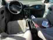 1997 Saturn SL with VIN 1G8ZF5283VZ202107, listed as a Copart auction lot 60572155 with 179,690 mi miles and Salvage title. Bid and sale history available at DreamBid. Image 8.