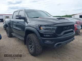 2022 Ram 1500 TRX with VIN 1C6SRFU97NN112337, listed as a IAAI auction lot 42210305 with 47,322 mi miles and . Bid and sale history available at DreamBid. Image 1.