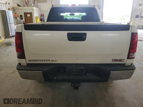 2013 GMC Sierra 1500 SLT с VIN 3GTP2WE79DG156685, выставлен на аукционе Copart как лот 55599185 с пробегом 220 968 миль миль и Списание • Salvage title. История ставок и продаж доступна на DreamBid. Изображение 6.