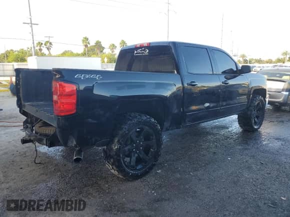 2015 Chevrolet Silverado 1500 LT with VIN 3GCUKREH8FG412928, listed as a Copart auction lot 83835165 with 168,723 mi miles and Salvage title. Bid and sale history available at DreamBid. Image 3.