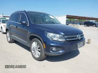 2014 Volkswagen Tiguan SEL with VIN WVGAV3AX1EW620455, listed as a IAAI auction lot 42847863 with 194,459 mi miles and . Bid and sale history available at DreamBid. Image 1.