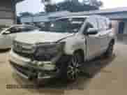 2020 Honda Pilot Touring 8-Passenger z VIN 5FNYF5H94LB003376, wystawiony jako Copart lot #61001285 z przebiegiem 73 291 mil mil oraz Szkoda całkowita • Salvage title. Historia ofert i sprzedaży dostępna na DreamBid. Obrazek 1.