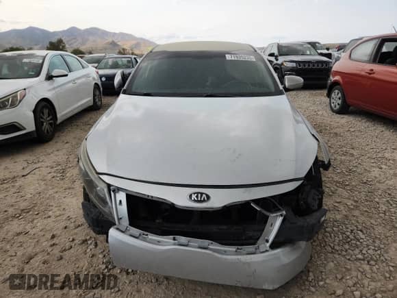 2015 Kia Optima LX z VIN 5XXGM4A75FG515363, wystawiony jako Copart lot #71935235 z przebiegiem Nie podano mil oraz Szkoda całkowita • Salvage title. Historia ofert i sprzedaży dostępna na DreamBid. Obrazek 5.
