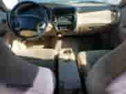 2000 Ford Explorer XLS with VIN 1FMZU72X6YZA15989, listed as a Copart auction lot 81274445 with 143,417 mi miles and Salvage title. Bid and sale history available at DreamBid. Image 8.