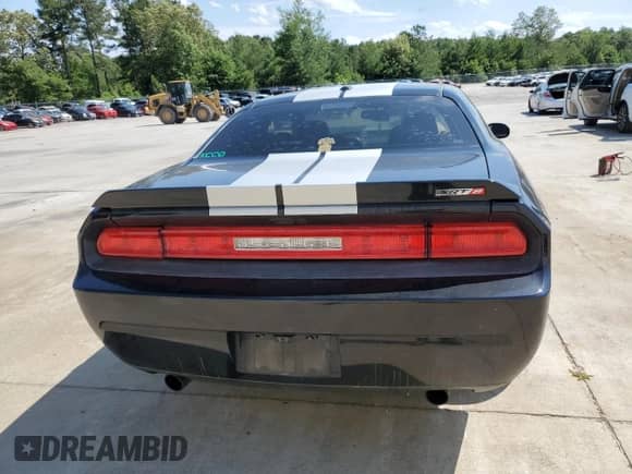 2012 Dodge Challenger SRT-8 392 с VIN 2C3CDYCJ4CH160486, выставлен на аукционе Copart как лот 58217515 с пробегом 149 085 миль миль и Списание • Salvage title. История ставок и продаж доступна на DreamBid. Изображение 6.