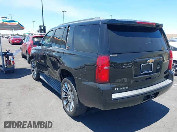 2017 Chevrolet Tahoe LT with VIN 1GNSCBKC2HR132565, listed as a IAAI auction lot 42624889 with 124,105 mi miles and . Bid and sale history available at DreamBid. Image 3.